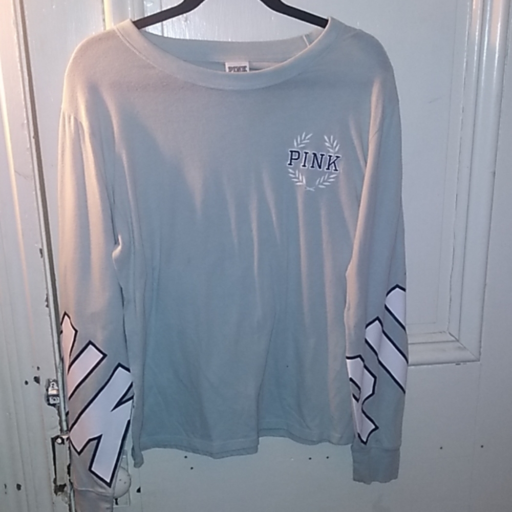 It's a pink long sleeve shirt